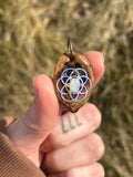sacred seed of life hickory nut pendant with moonstone