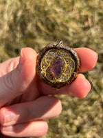 sparkly gold seed of life acorn with amethyst chunk