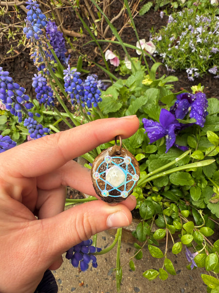 olivia metatrons cube moonstone walnut pendants